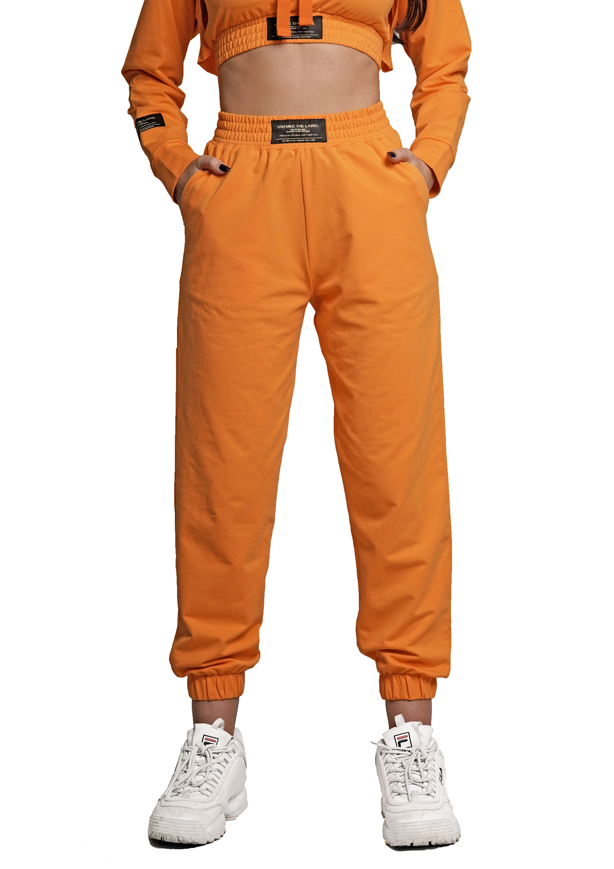 Women's VAN MILE Lounge Joggers in Melon Orange – front view, shown with matching cropped top